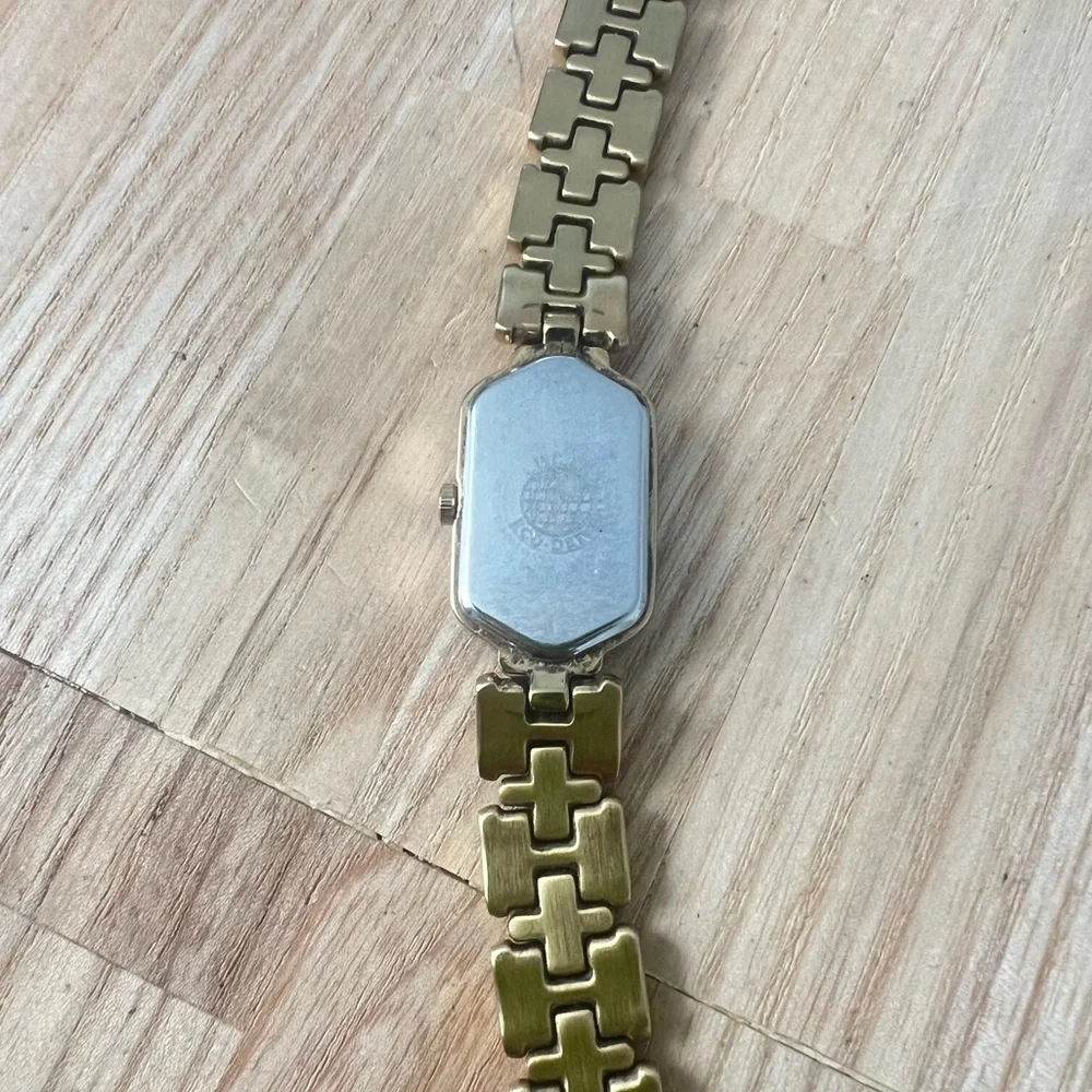 Citizen eco drive ladies gold tone hexagonal bracelet watch